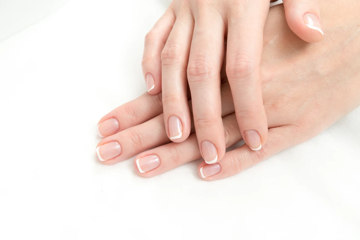 Short nails with fine white French tips